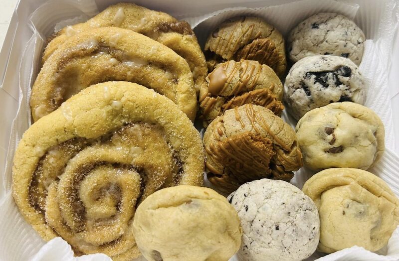 Assorted decorated cookies and baked treats from Treat Yourself Cake Pops